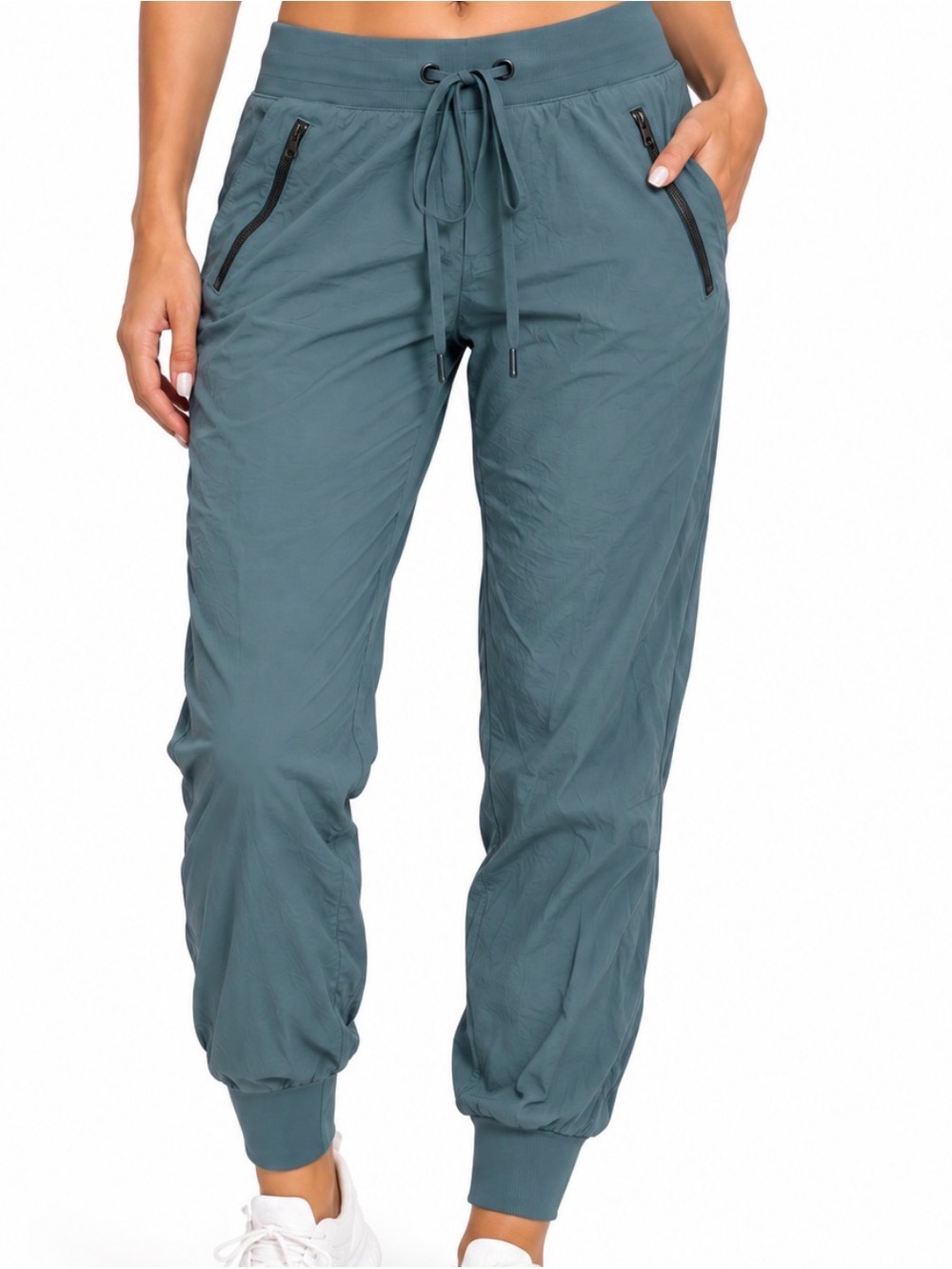 Athleta Trekkie North Jogger teal nylon lightweight activewear Zip Pockets SZ 2
